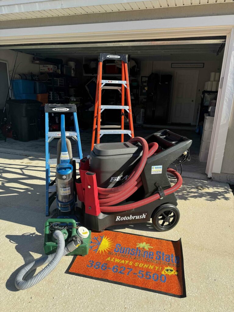 Sunshine State's RotoBrush duct cleaning equipment set up in a customer's garage